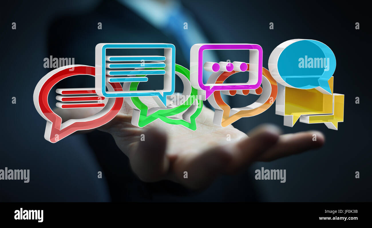 Geschäftsmann auf unscharfen Hintergrund mithilfe digitaler bunte 3D-Rendering Gespräch Symbole Stockfoto