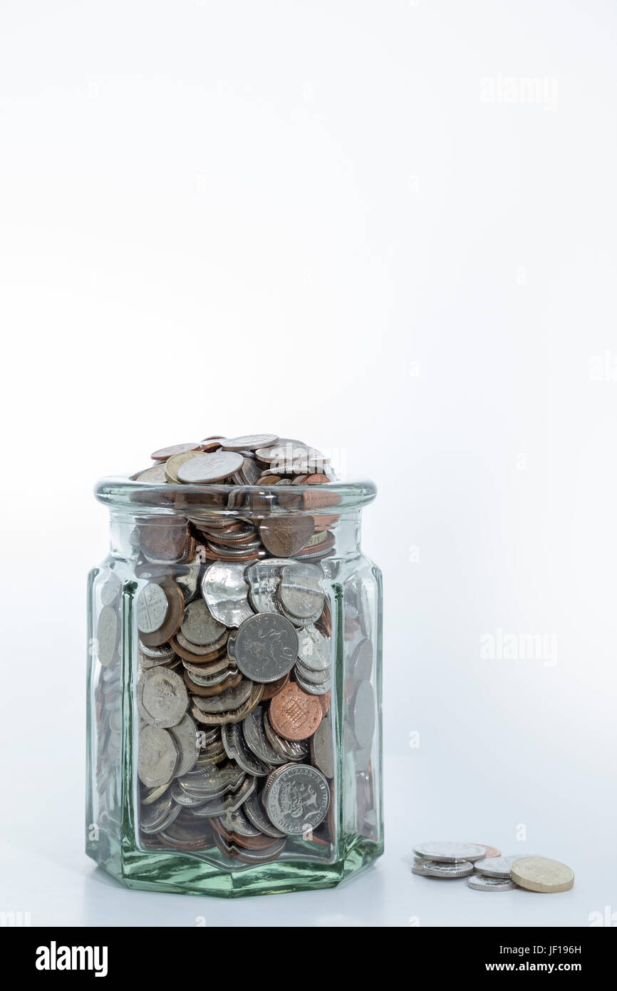 Jar-voller UK Sterling Münzen. Stockfoto