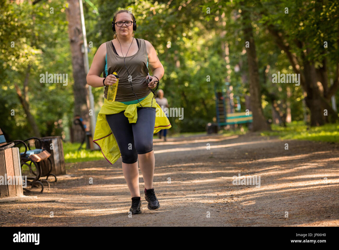 Übergewichtige Frau läuft. Gewicht-verlust-Konzept Stockfoto