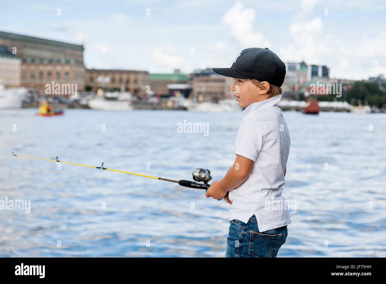 Junge Stadt Angeln Stockfoto