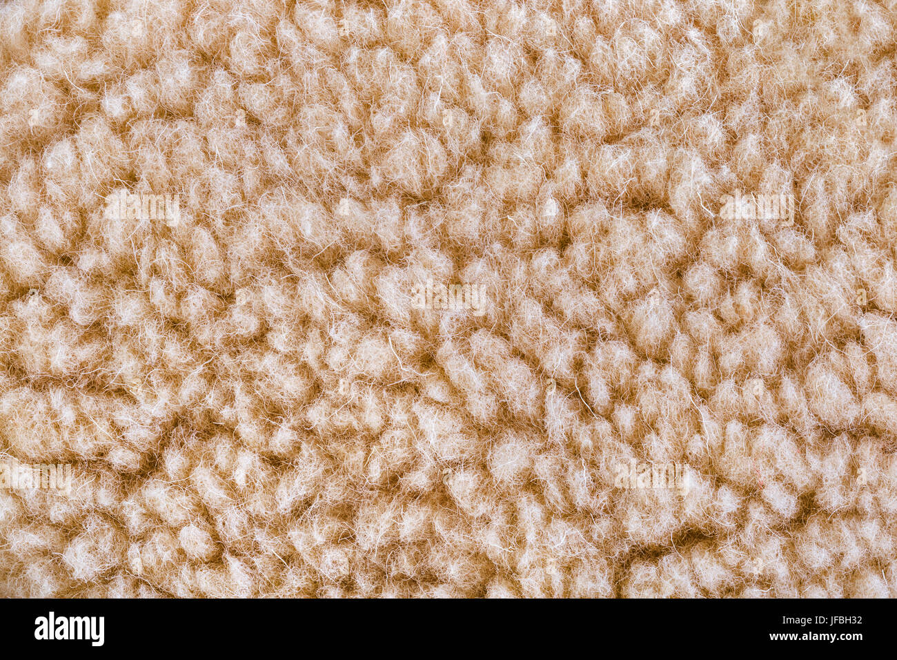 Wollige Schafe fleece-Hintergrund Stockfoto