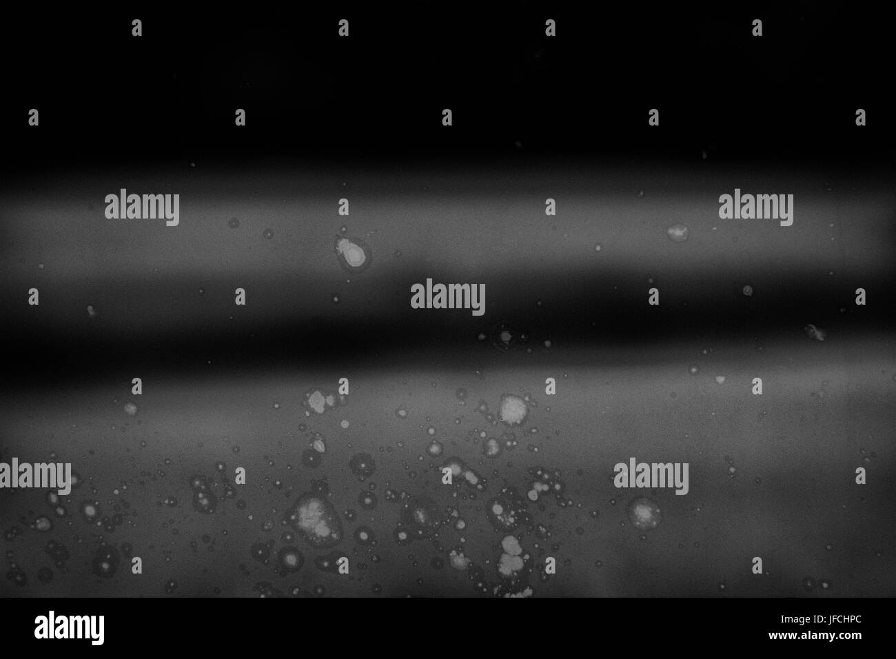 Abstrakte monochrome Hintergrund mit Scratch Stockfoto