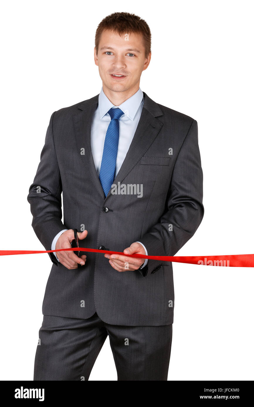 Geschäftsmann im Anzug schneiden rote Schleife mit Schere isoliert auf  weißem Hintergrund. Feierliche Eröffnung Konzept. Traditionellen  öffentlichen Festakt Stockfotografie - Alamy