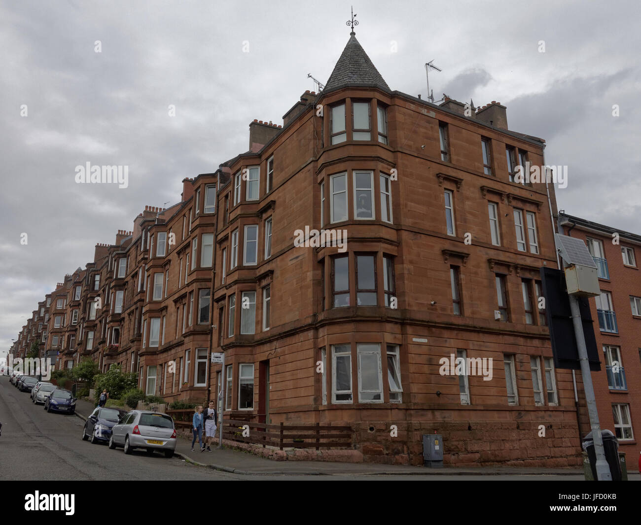 Glasgow Mietskasernen leben Hintergrund roter Sandstein Erker in der Perspektive Stockfoto