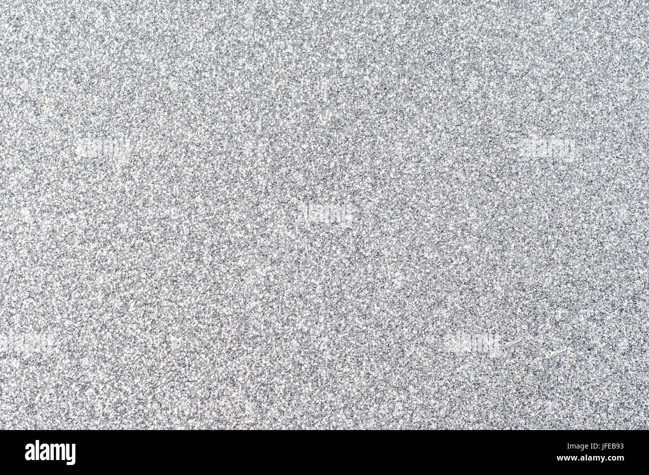 Funkelnde Silber Glitter Textur Hintergrund, Rahmen gleichmäßig verteilt. Stockfoto
