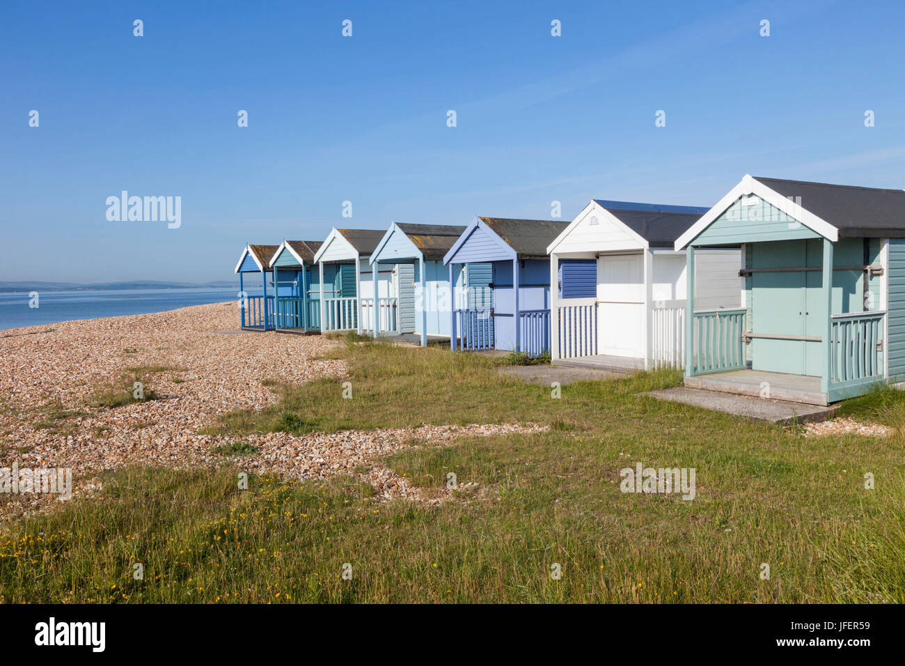 England, Hampshire, Calshot, Strandhütten Stockfoto