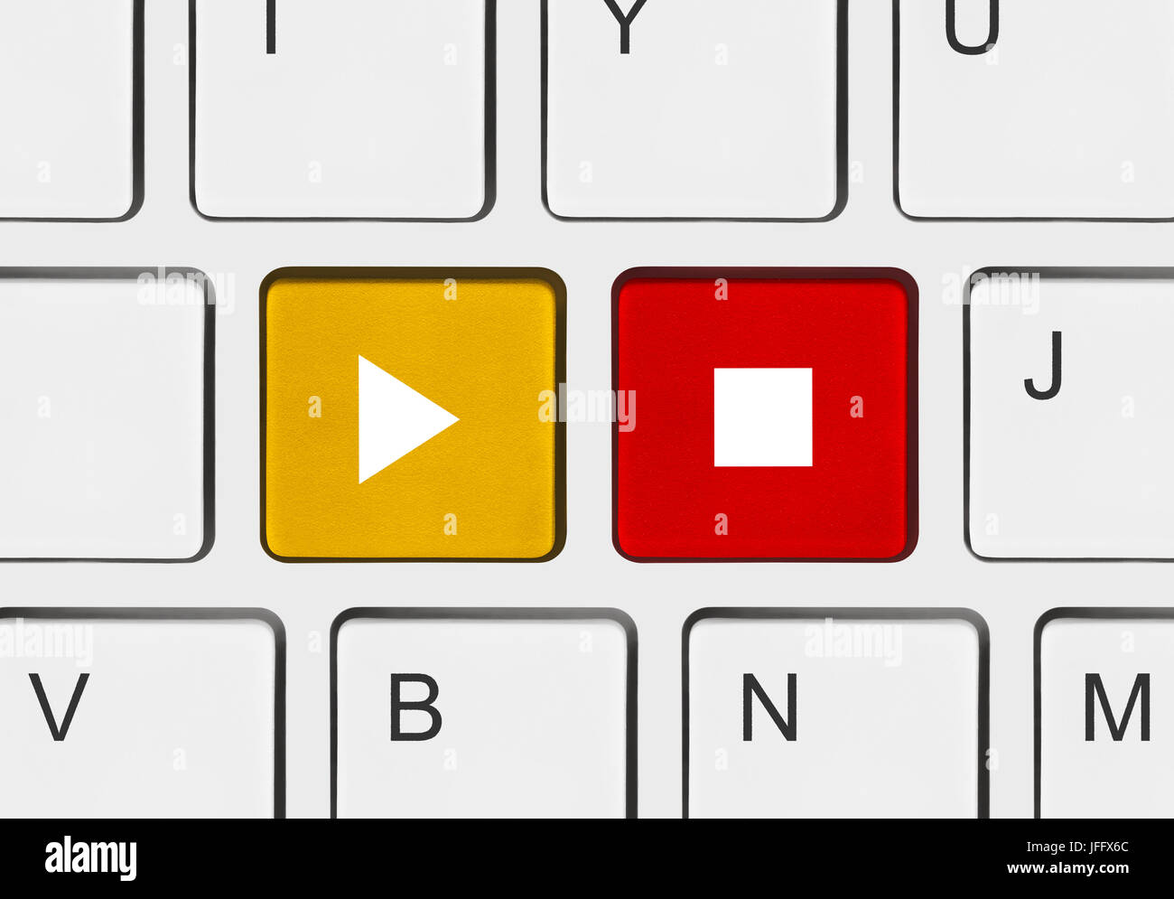 Computer-Tastatur mit Play und Stop Tasten Stockfoto
