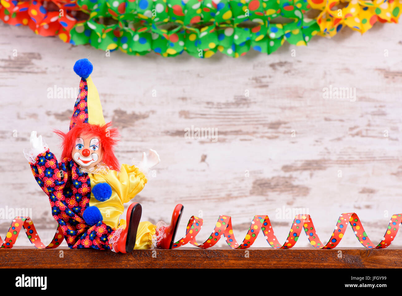 Puppe als Clown mit Karneval Kostüm und Kopie Quadrat Stockfoto