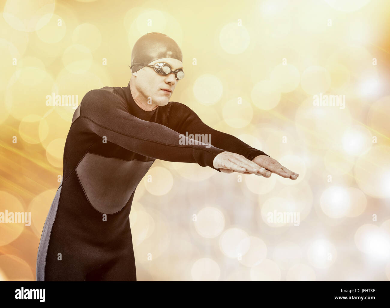 Zusammengesetztes Bild des Schwimmers im Neoprenanzug beim Tauchen Stockfoto