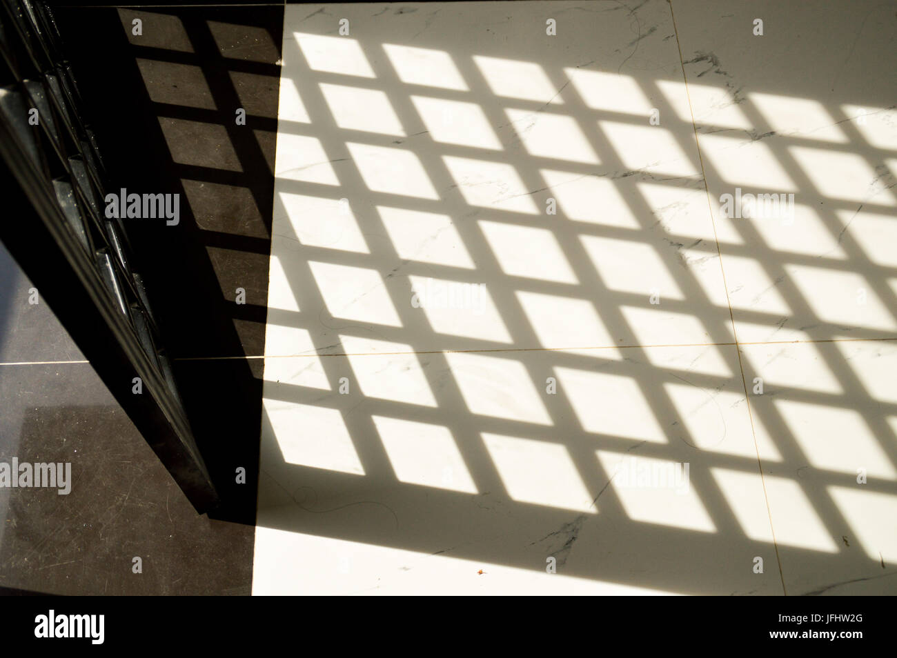 Schatten auf dem Boden reflektiert Stockfoto