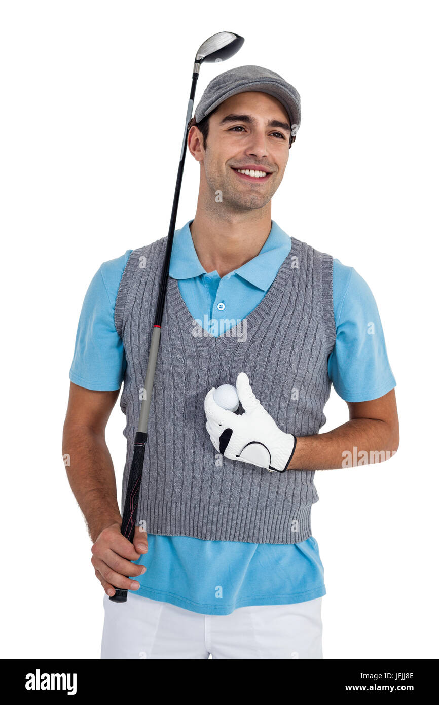 Glücklich Golfspieler stehend mit Golfball und Golfschläger Stockfoto