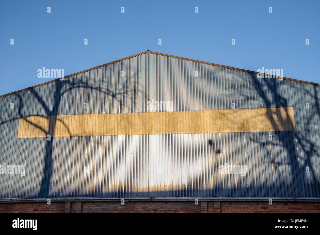 Symbol / Konzepte, Schatten von der Einstellung so an der Wand des Hauses Stockfoto