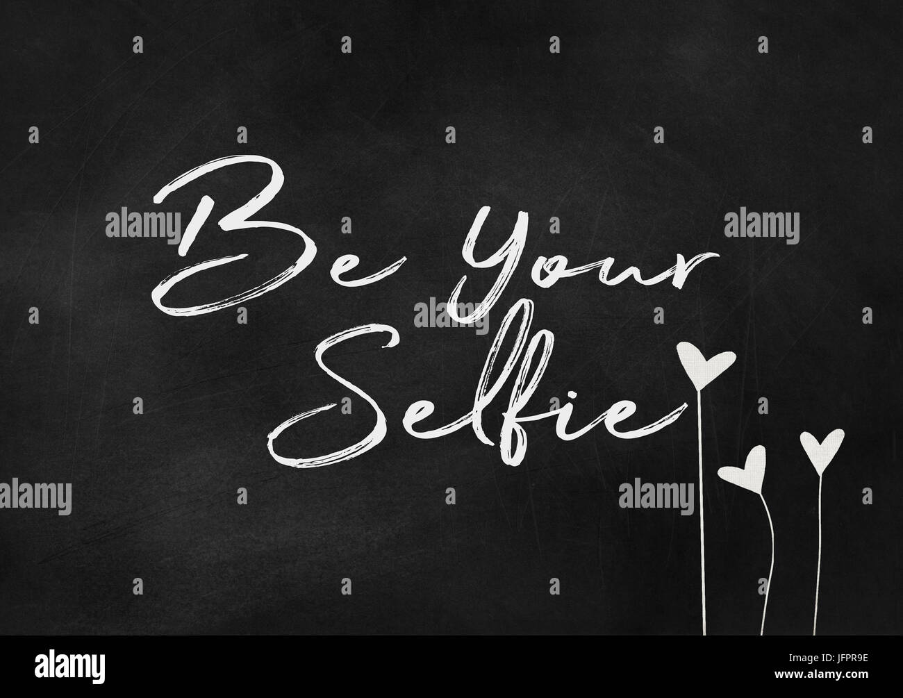 inspirierende werden Ihre Selfie Text in weißer Kreide auf strukturierte schwarze Tafel Stockfoto