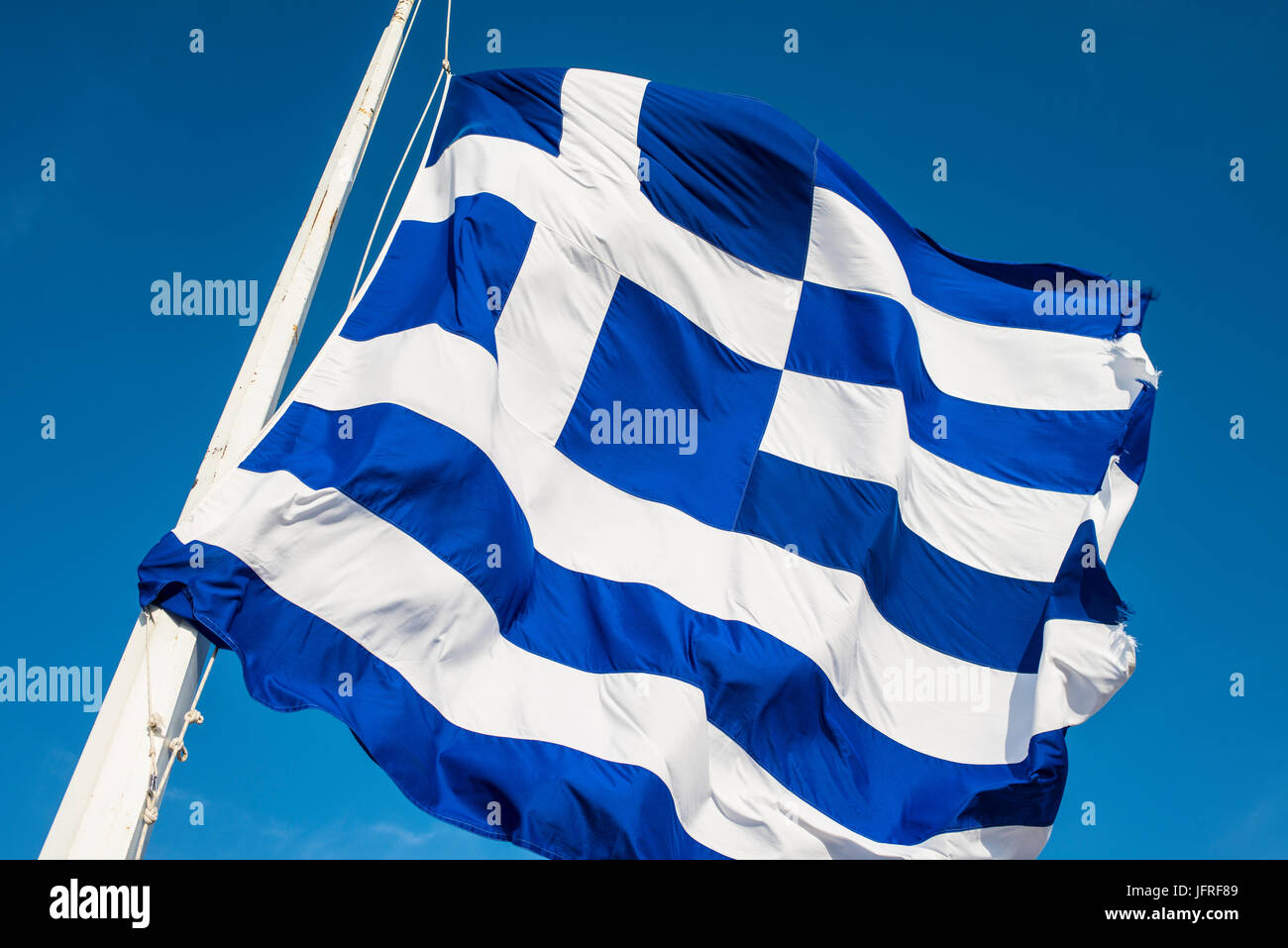 Griechische Flagge im Wind flattern Stockfoto