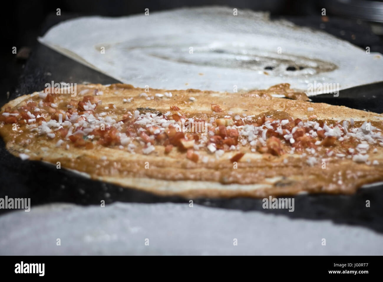 Masala Dosa auf der Pan. Stockfoto