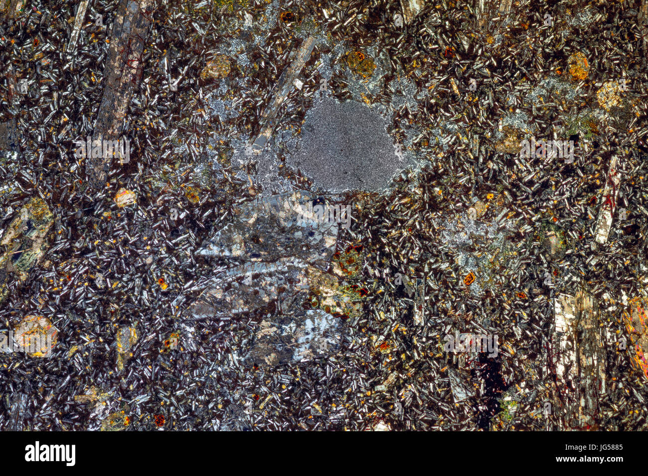 Andesit, Somerset. Reichlich Vulkangestein mit einer Grundmasse der Sub-Millemetre Größe Kristalle. Wichtigste Mineral Plagioklas. Pyroxines, Eisenoxide. Stockfoto