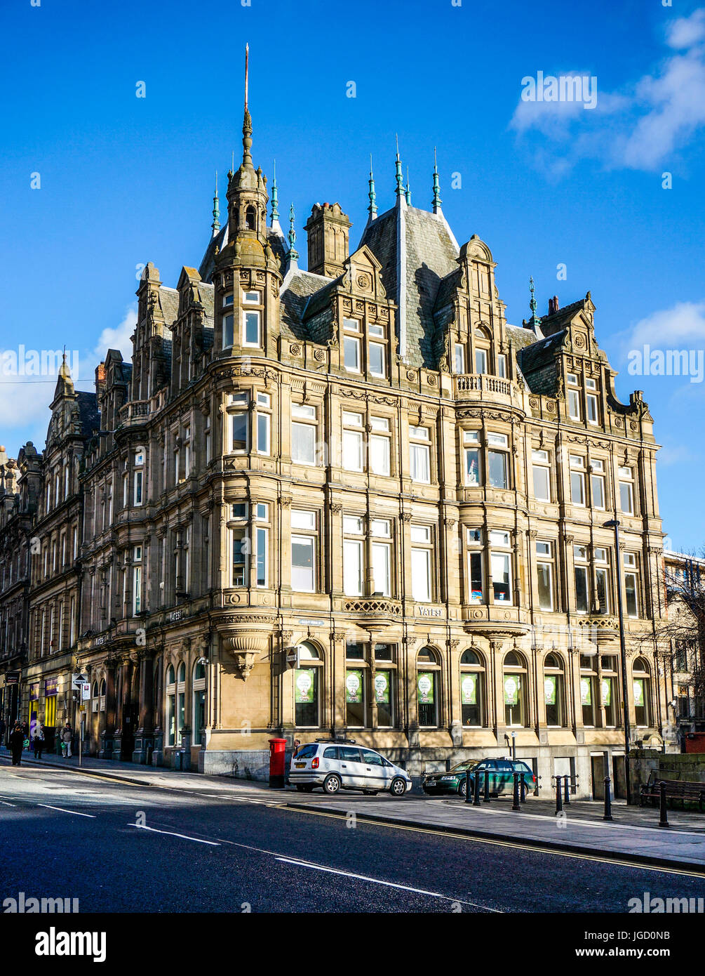 Imposante Gebäude in warmen Winter Sonnenlicht gebadet, an der Ecke der Grainger Street, City Centre, Newcastle upon Tyne, Tyne und Wear, England, UK. Stockfoto