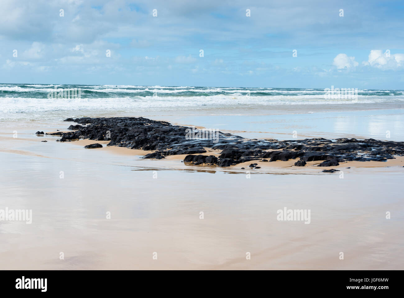 Kaffee Felsen hergestellt aus Sand am Strand von Fraser Island, Queensland, Australien. Stockfoto