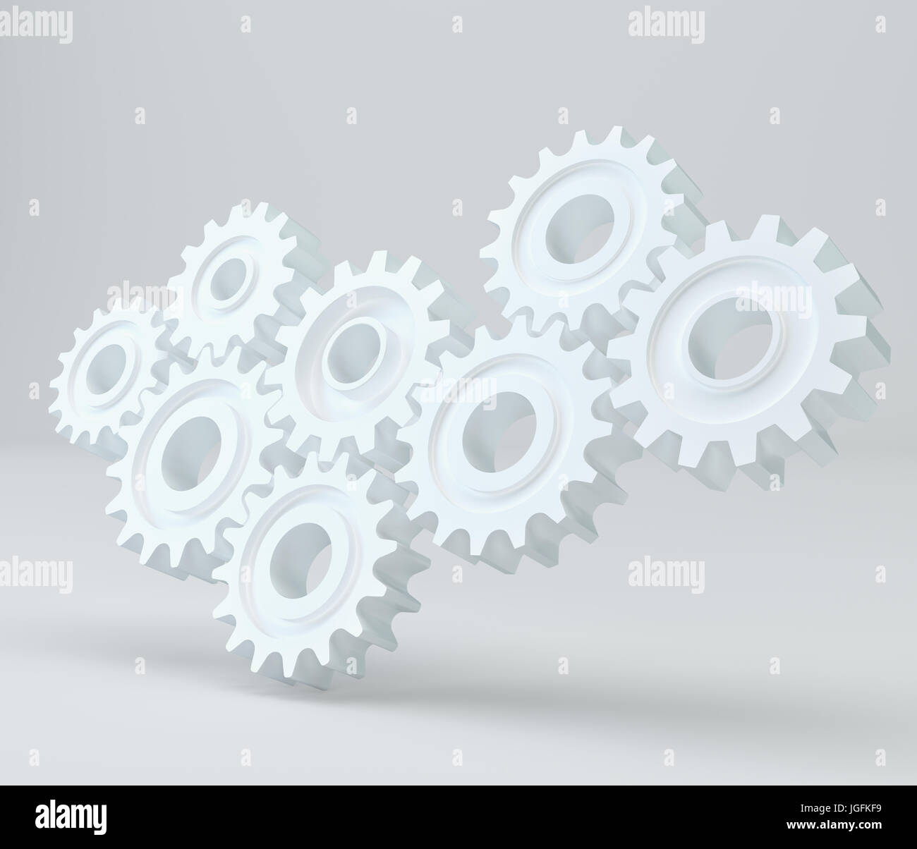 Zahnräder auf grauem Hintergrund. 3D-Rendering Stockfoto