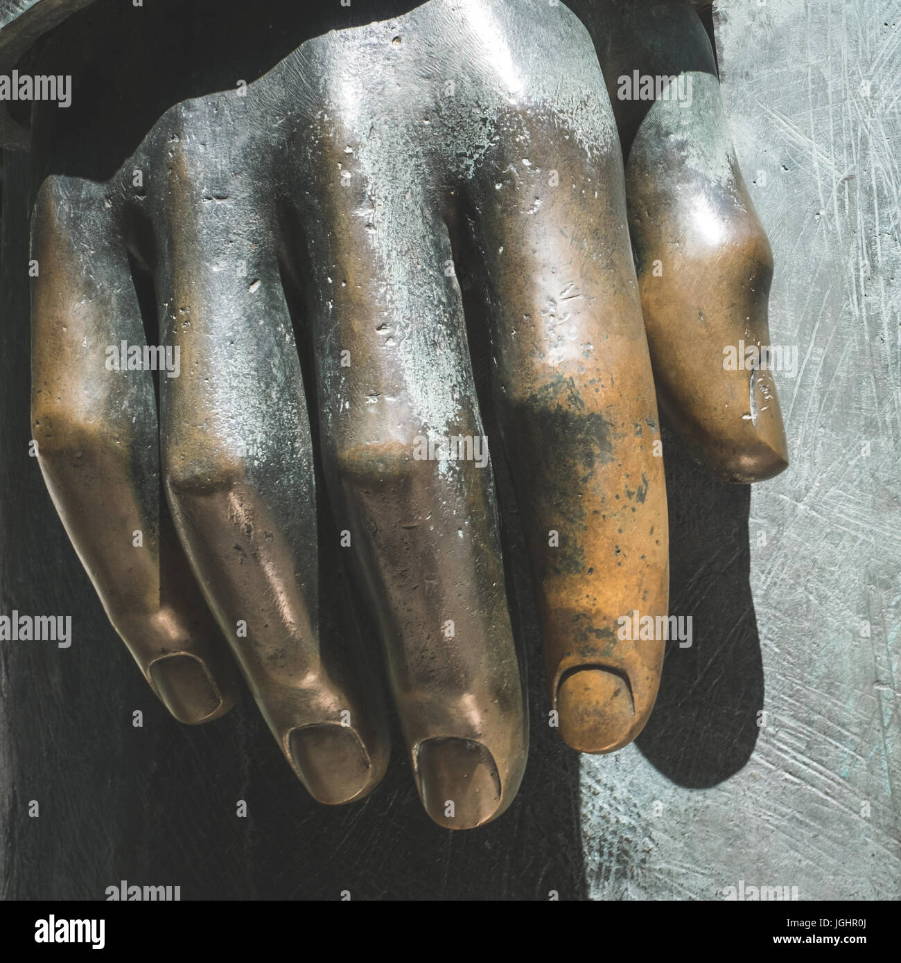 Closeup - Bronze-Statue, Skulptur von Hand zu Hand Stockfoto