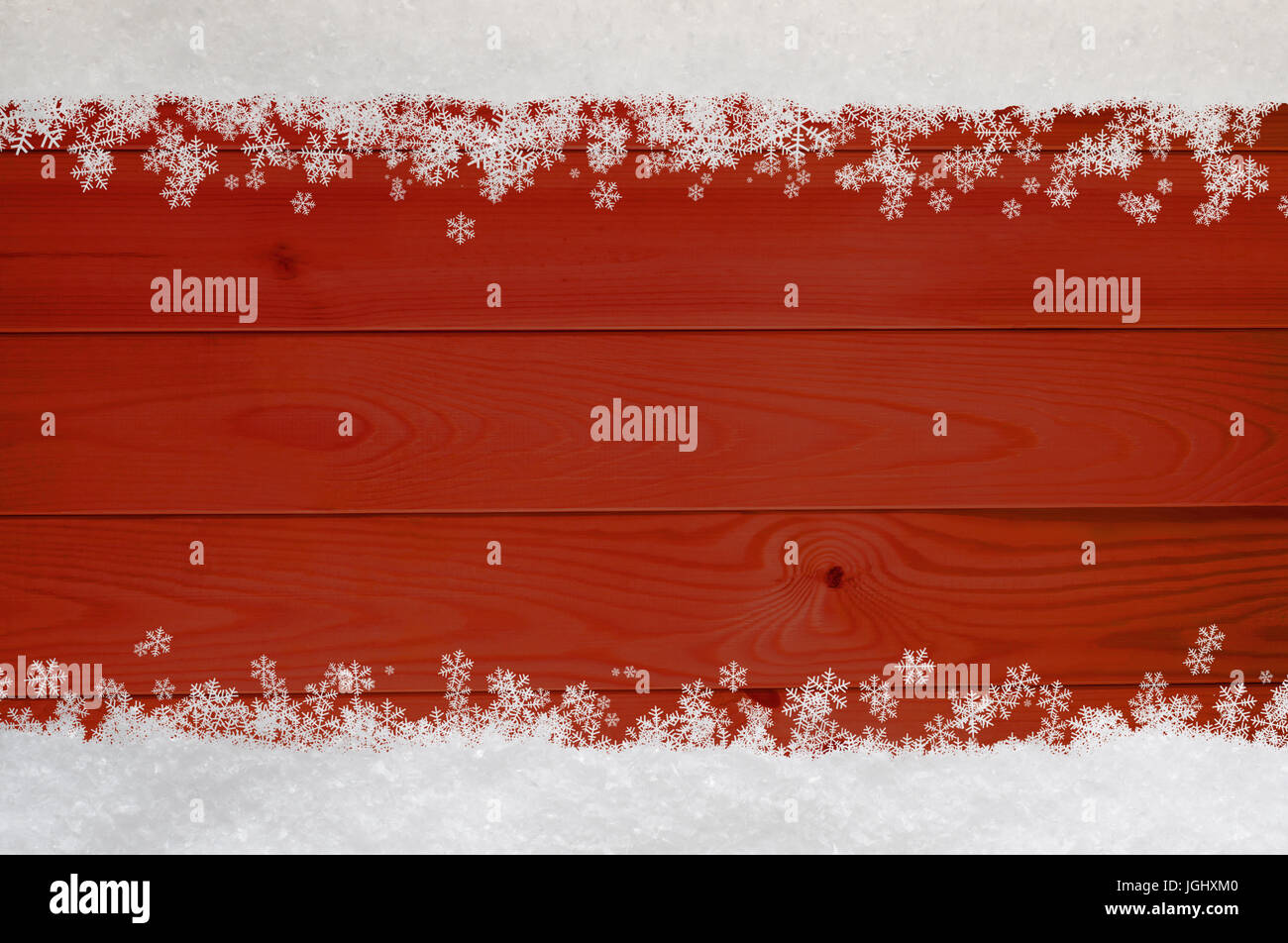 Weihnachten Schnee und Schneeflocken Grenze am oberen und unteren roten Holz Beplankung. Stockfoto