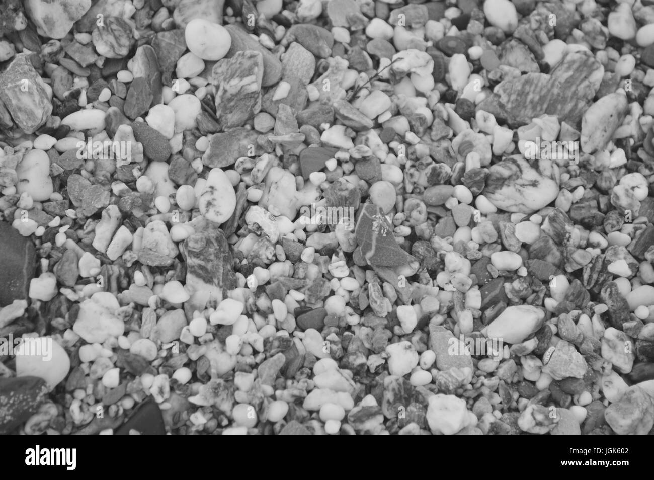 Schotter und Kies natürlichen Hintergrund, schwarz, weiß und grau. Stockfoto