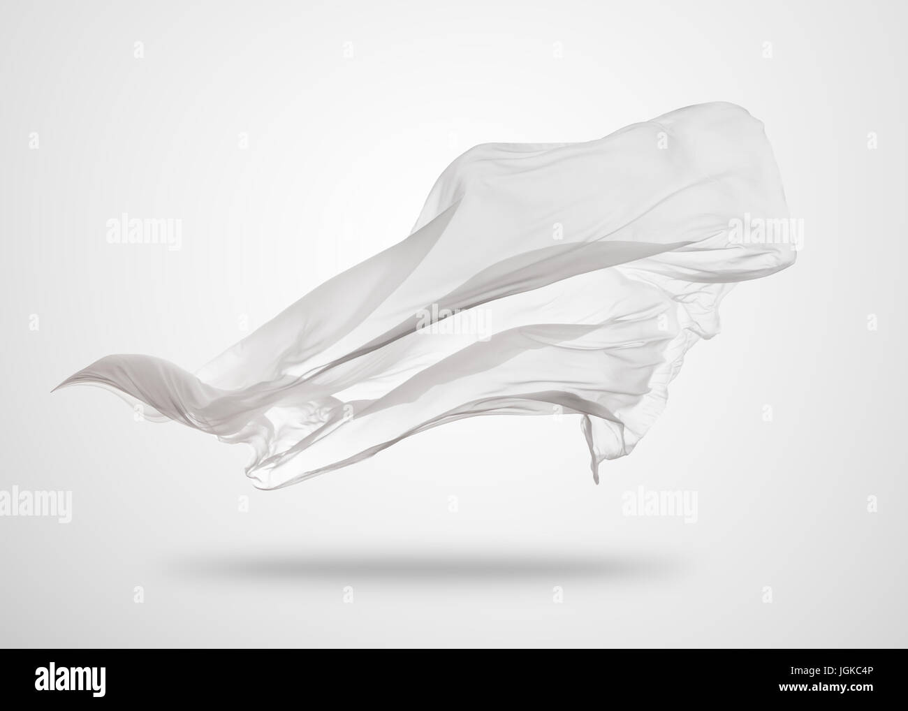 Glattes eleganten transparentes weißes Tuch getrennt auf grauem  Hintergrund. Textur des Fliegens Stoff Stockfotografie - Alamy