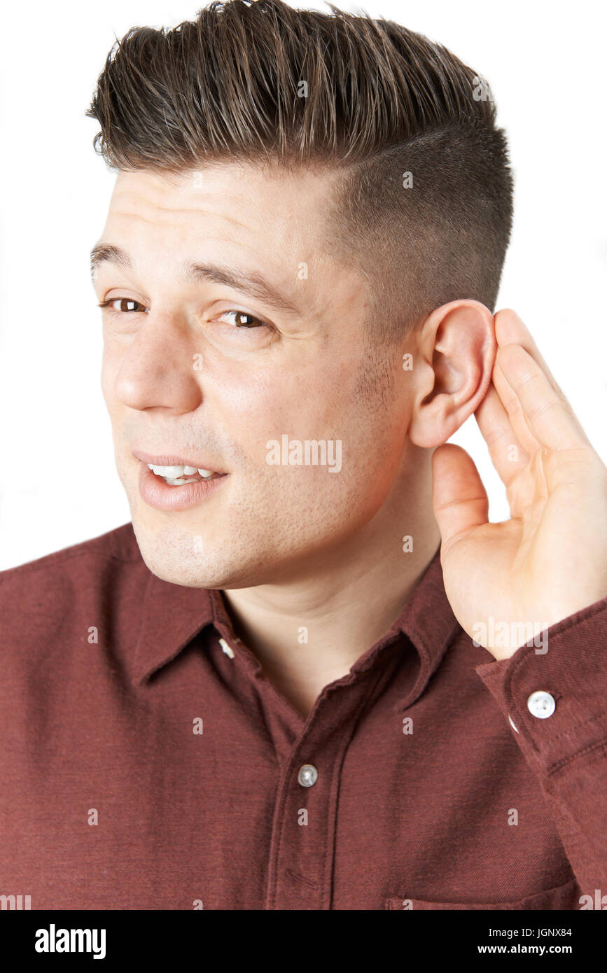 Junger Mann leiden mit Schwierigkeiten zu hören Stockfoto