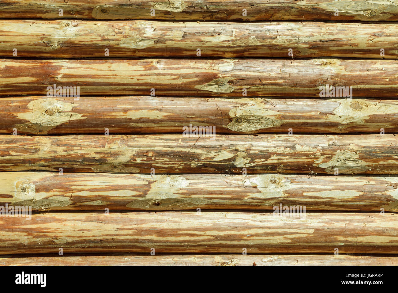 Blockhaus oder Scheune unlackiert entrindetes Wand texturiert horizontale Hintergrund mit Textfreiraum Stockfoto