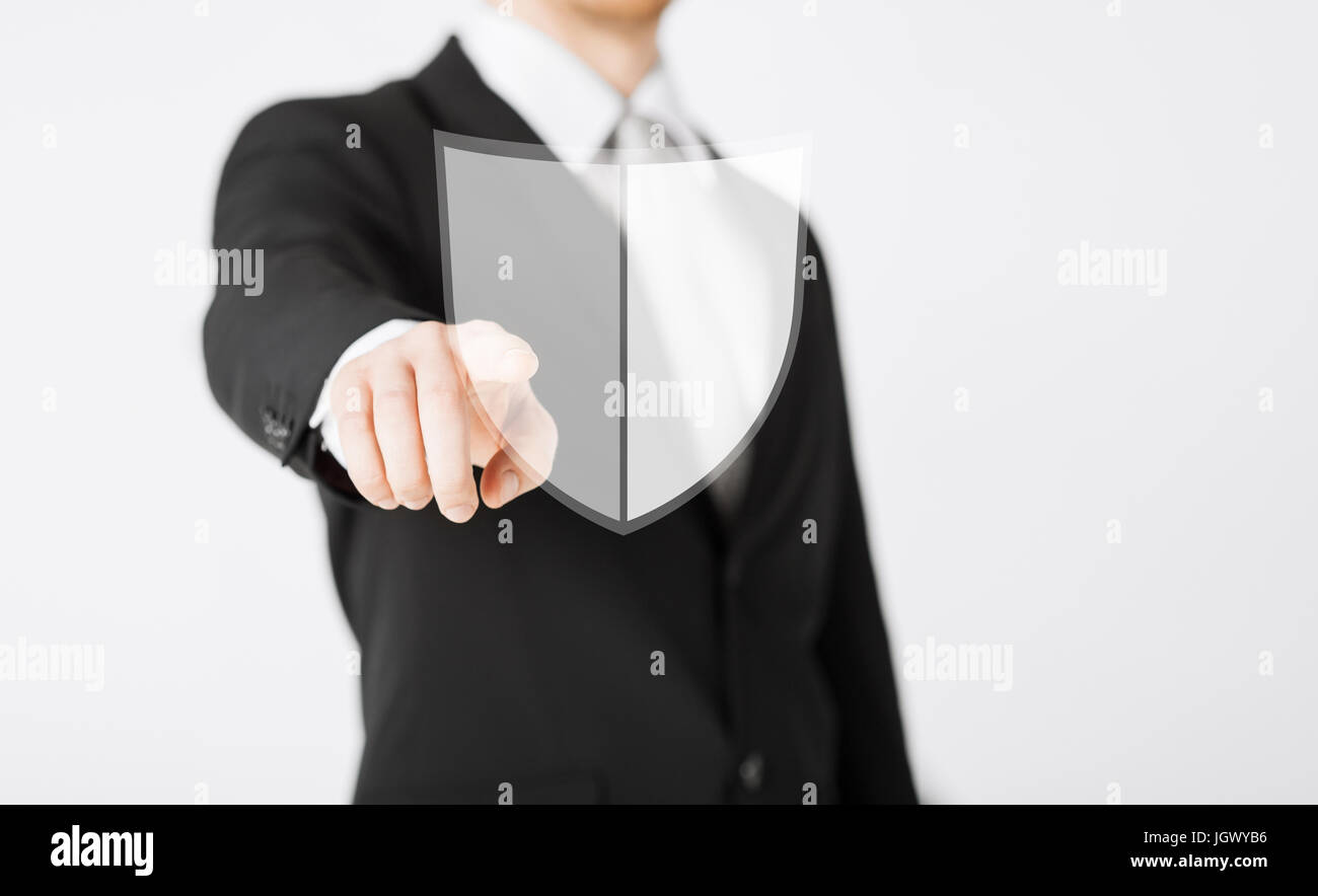Mann Zeigefinger auf antivirus-Programm-Symbol Stockfoto