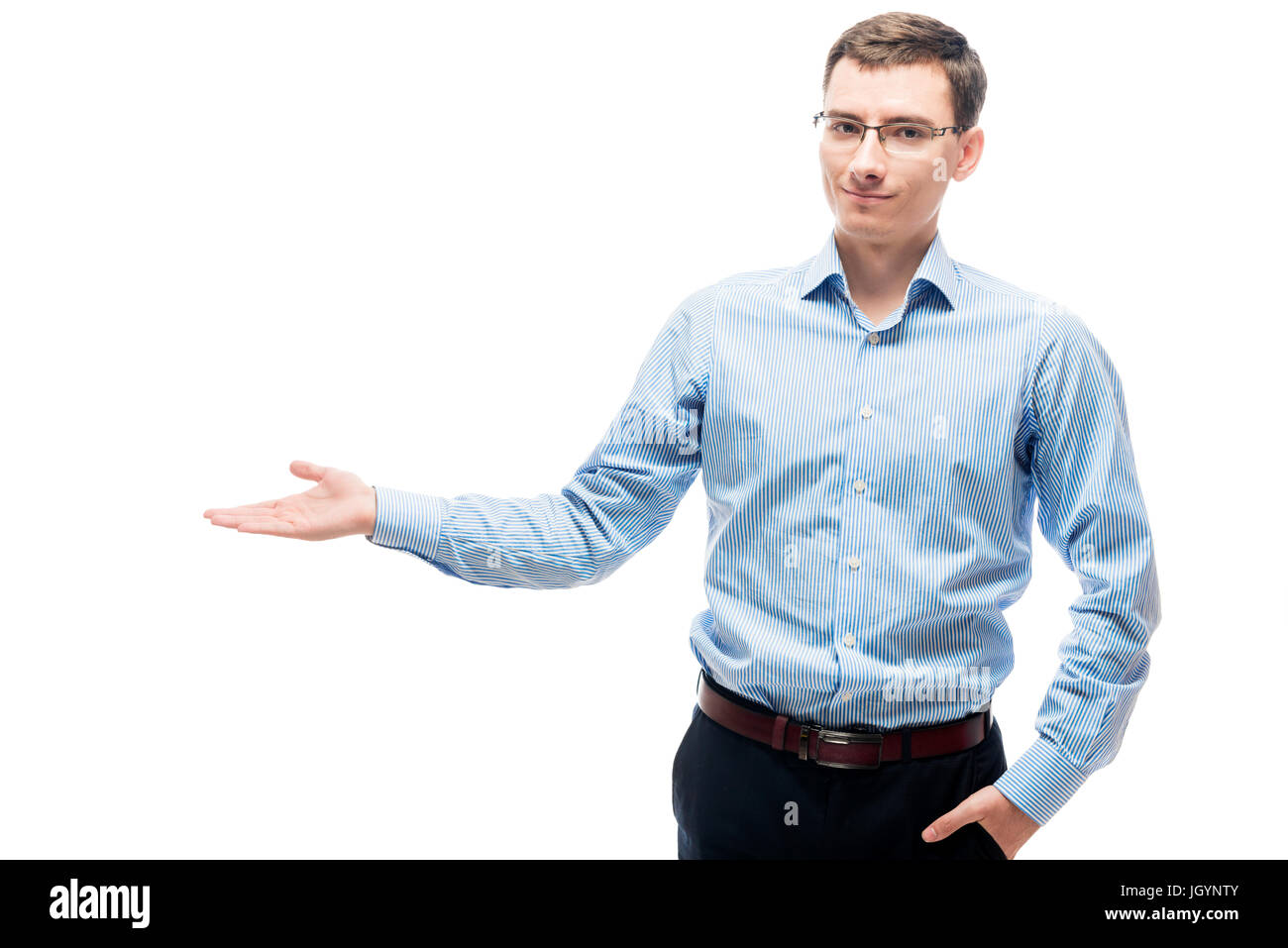 Geschäftsmann präsentiert Raum auf der linken Seite auf weißem Hintergrund Stockfoto