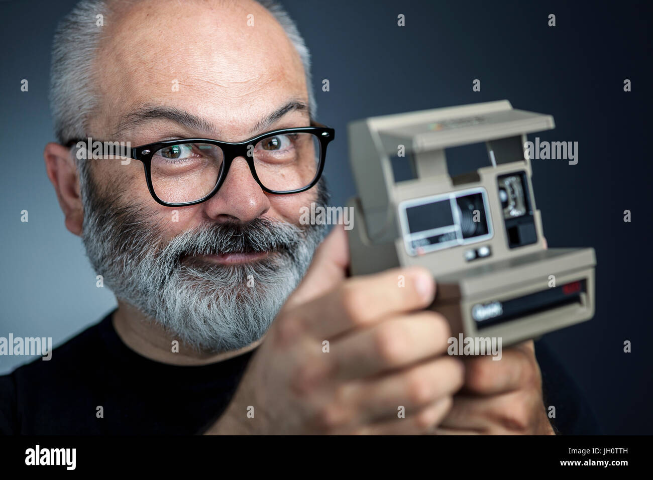 Fotograf mit alten schnellen Kamera Stockfoto