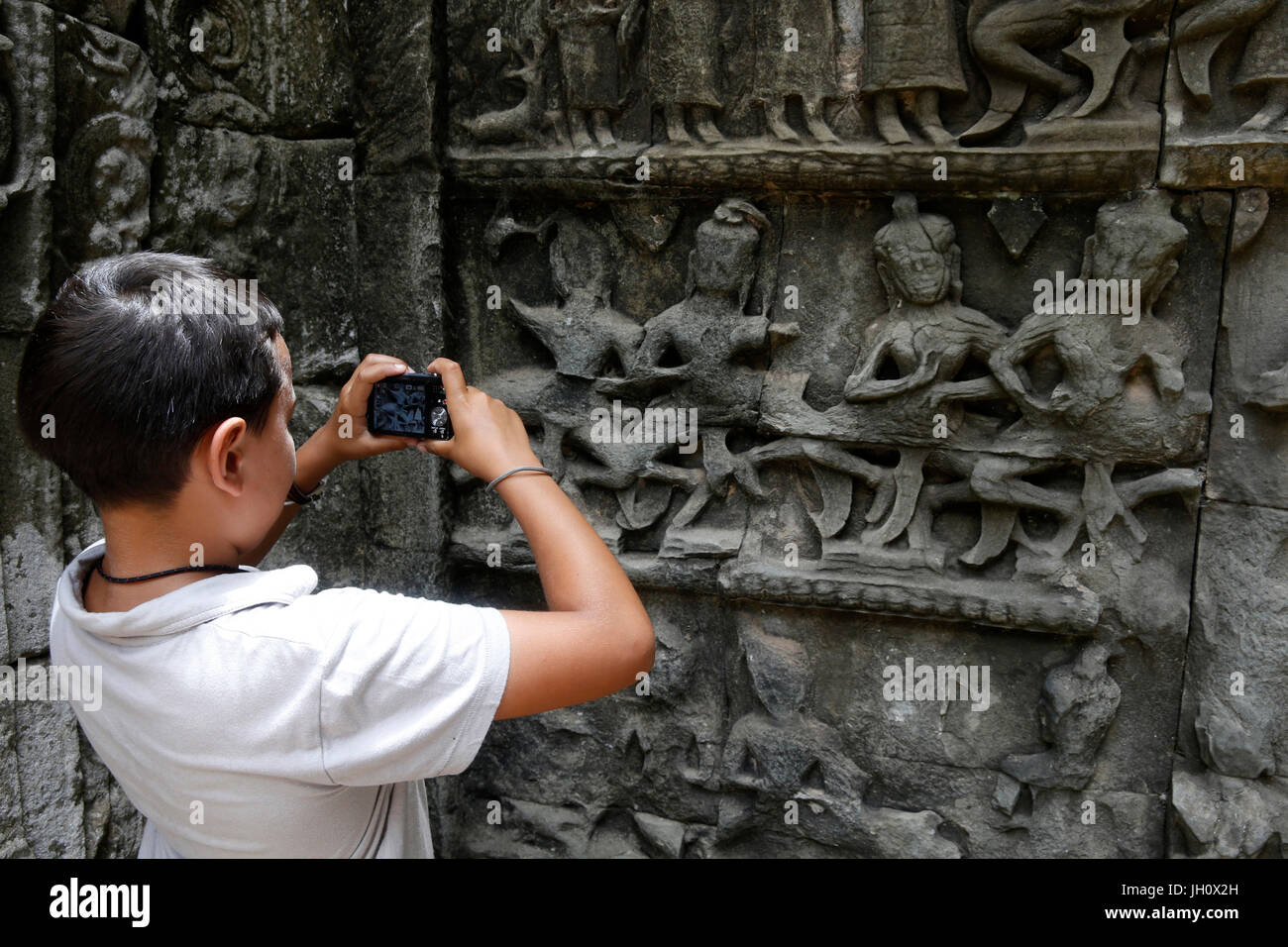 10-Jahr-alte junge besucht Angkor. Kambodscha. Stockfoto