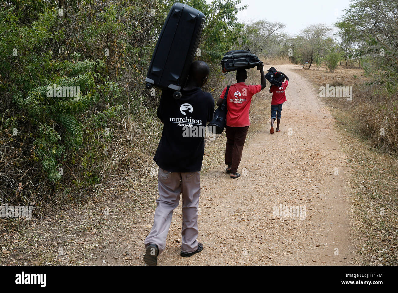 Einreichen Sie Mitarbeiter mit Gepäck. Uganda. Stockfoto
