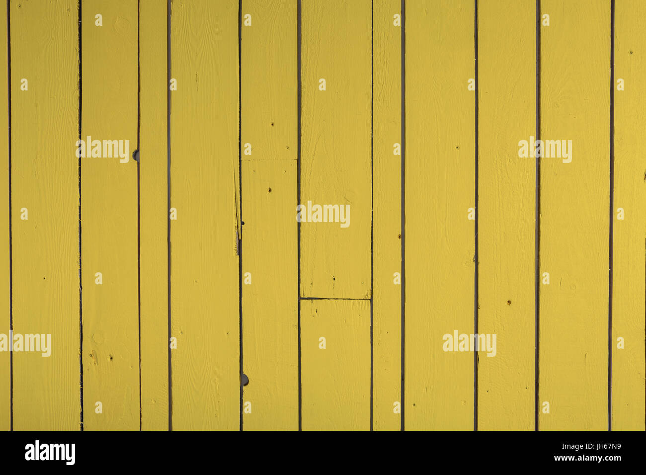 Gelbe aufgearbeiteten Holz Wand backgound Stockfoto