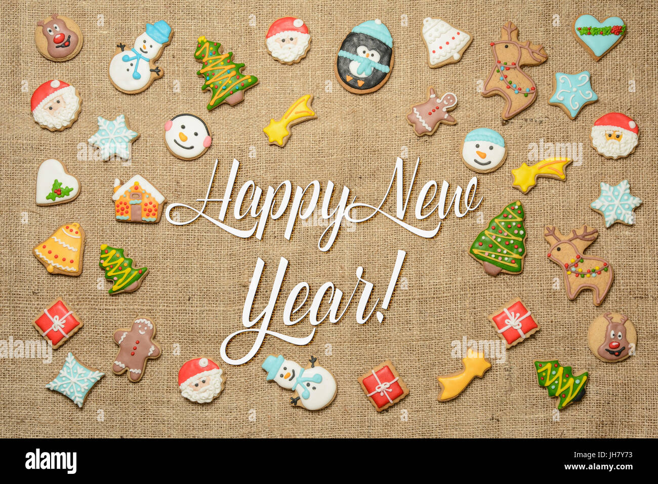 Frohes neues Jahr! Weihnachtskarte geschrieben unter dekorativen Lebkuchen. Stockfoto