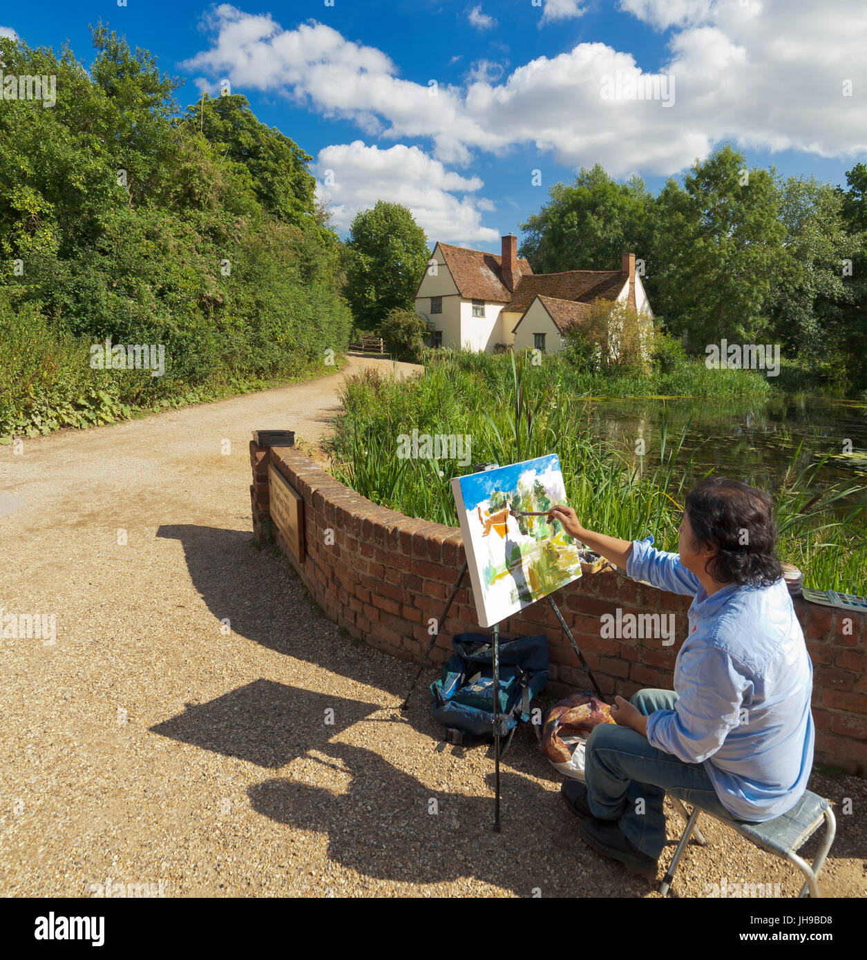 Künstler malen Lott Hütte von Flatford Mill, wo John Constable die Heuwagen gemalt. Stockfoto