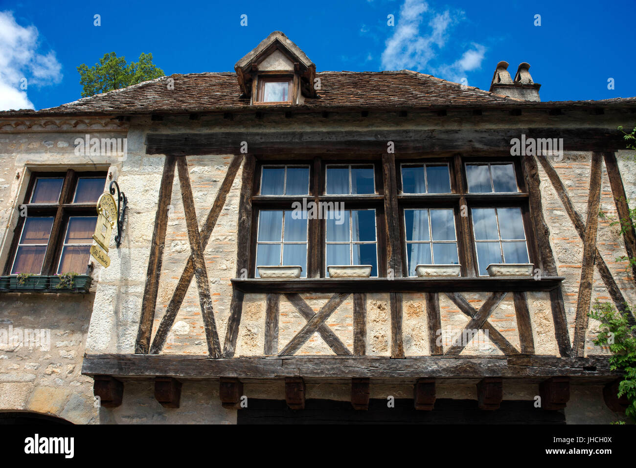 Vorderhaus in dem Dorf Saint Cirq Lapopie, MIDI-Pyrénées, Lot, Frankreich. Detail eines alten Hauses Stockfoto