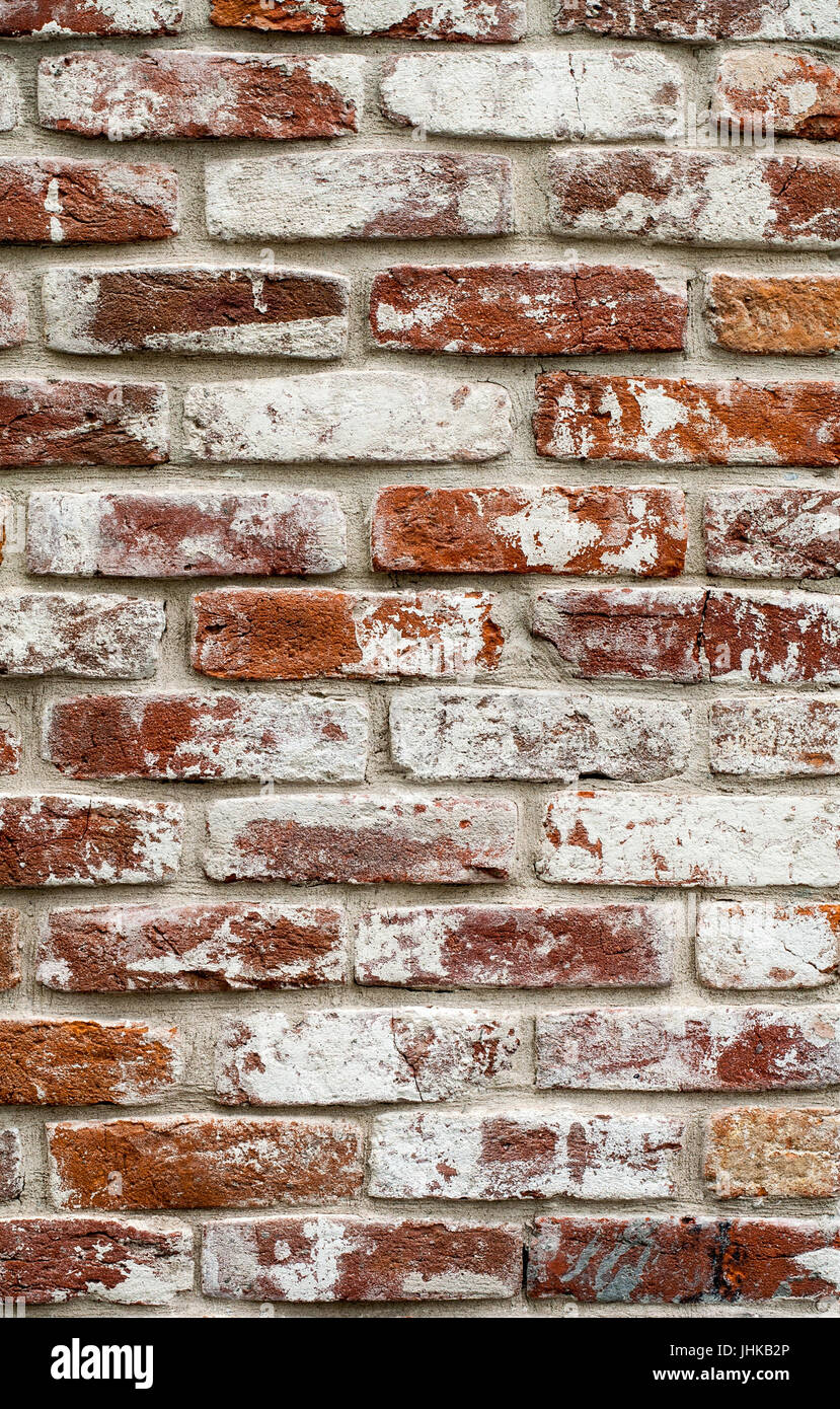 Roten Backsteinmauer weiß lackiert. Textur, Hintergrund, Design. Stockfoto