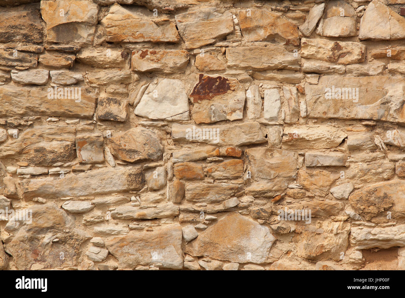 Das Detail, Großaufnahme der Sandstein gemauerten Wand. Die Textur des Sandsteins. Als Hintergrund kann es Useld sein. Stockfoto