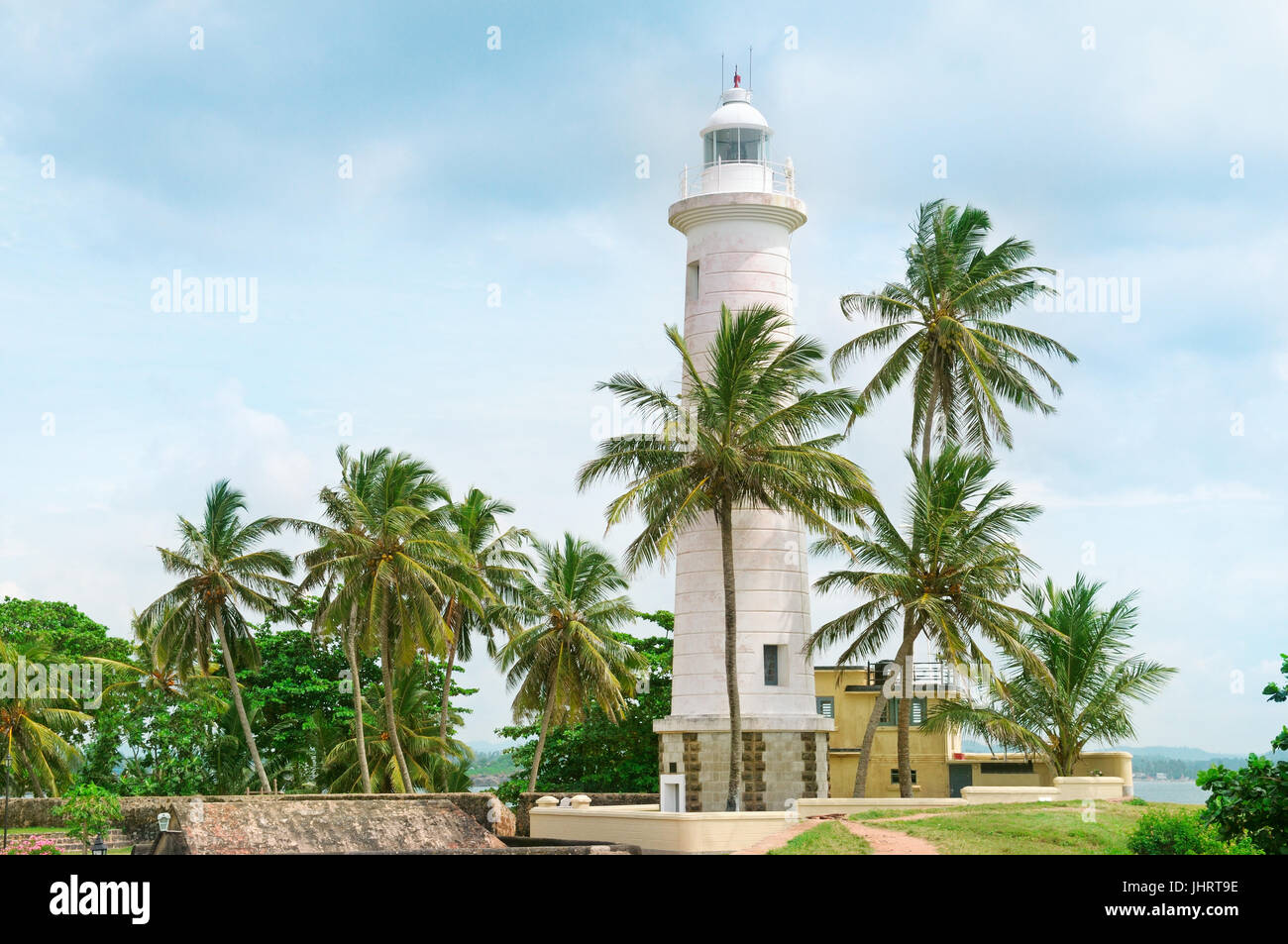 Leuchtturm und Palmen Bäume in der Stadt von Galle, Sri Lanka Stockfoto