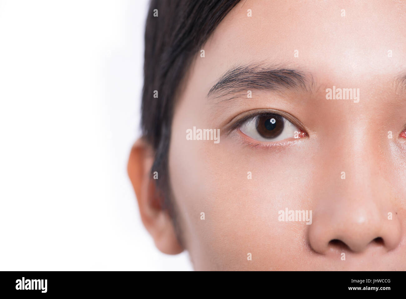 Nahaufnahme Bild eines Teenagers Augen in die Kamera schaut Stockfoto