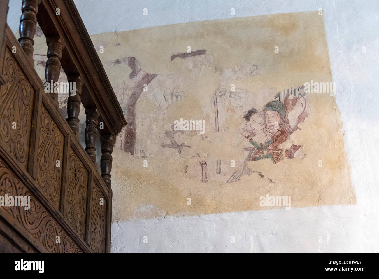 Restaurierte mittelalterliche Wandmalerei an den Wänden der Kirche St. Winfreds, Branscombe, Devon Stockfoto