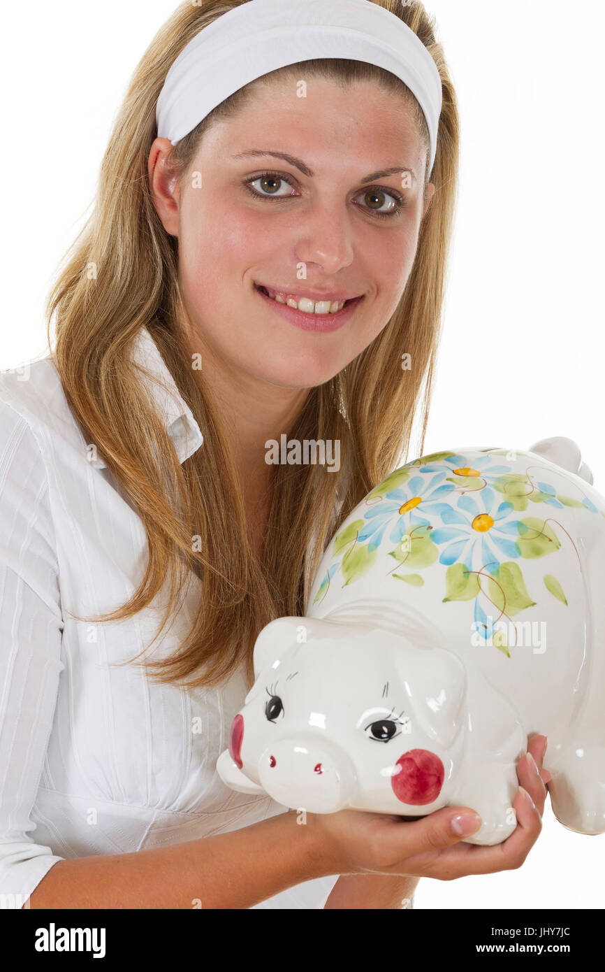 Junge Frau hält Sparschwein - junge Frau mit Sparschwein, Junge Frau Hält Sparschwein - junge Frau mit Sparschwein Stockfoto