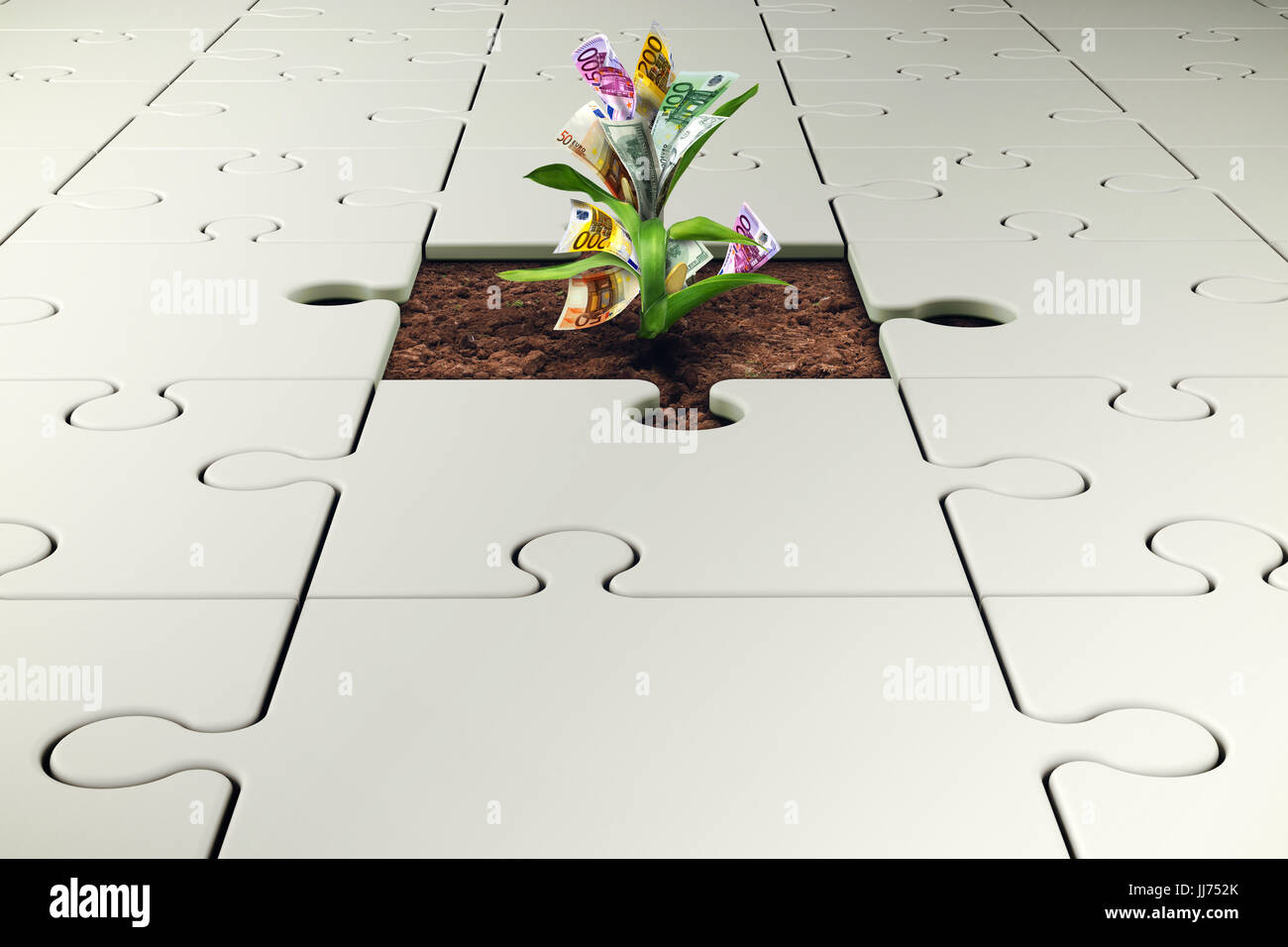 Pflanze mit Geld wächst aus einem fehlenden Stück puzzle Stockfoto