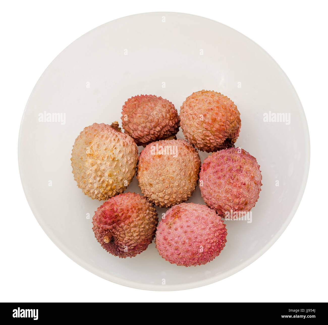 Die Litschi (Litchi Chinensis)-Früchte, Nahaufnahme, Makro, isoliert. Gattung in einer weißen Schüssel Stockfoto