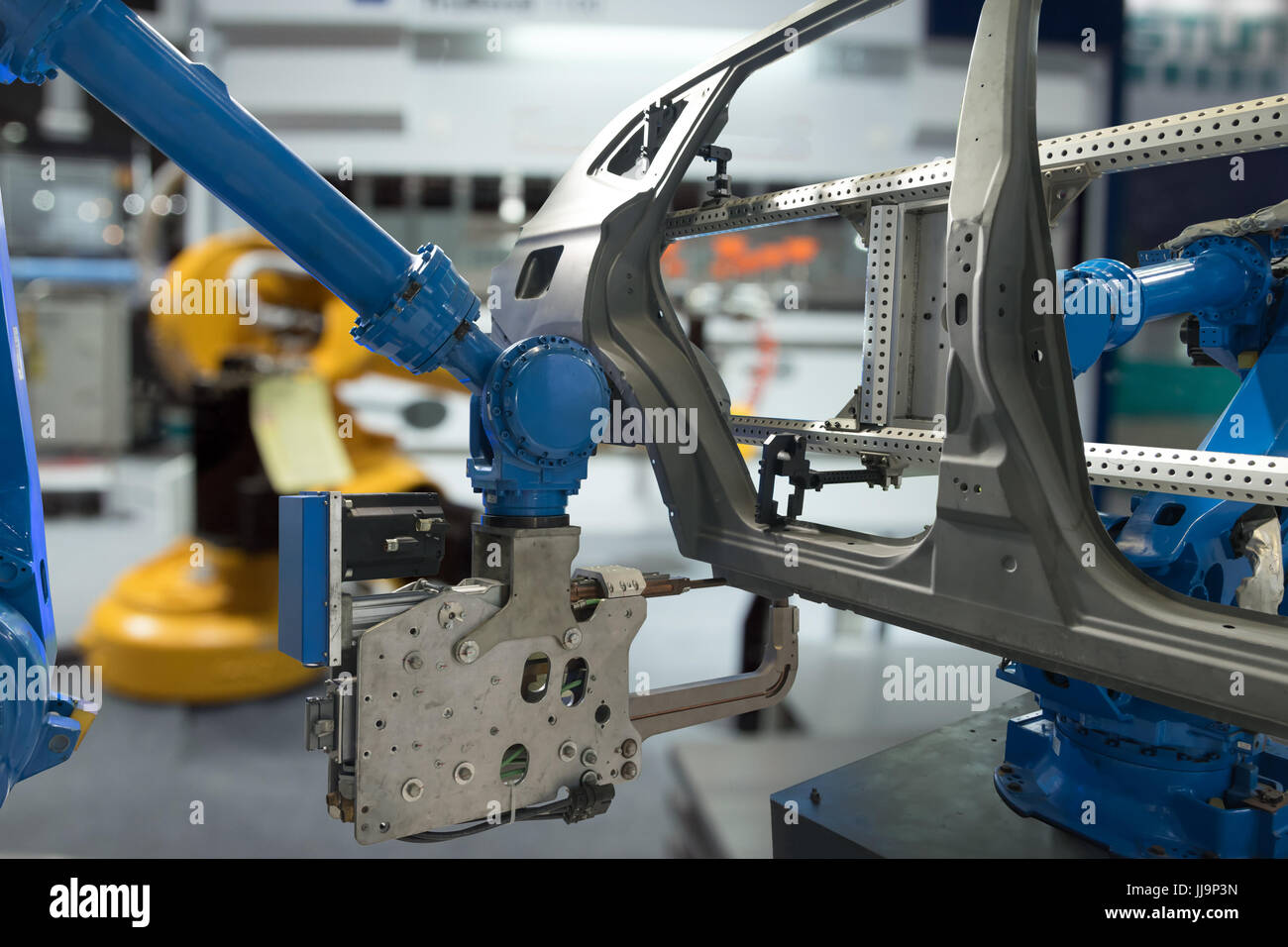 Automobil Produktion Produktion Industriemaschine, Fabrik Roboter arm in smart Factory und Industrie 4.0 Konzept. Stockfoto