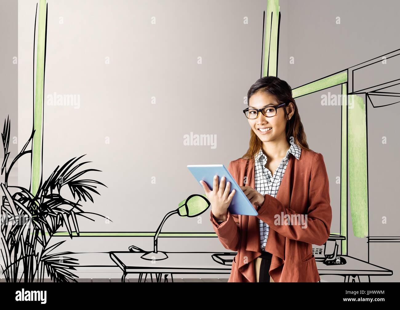 junge Geschäftsfrau lächelnd mit Tablet vor den Bauplan des neuen Büros Stockfoto