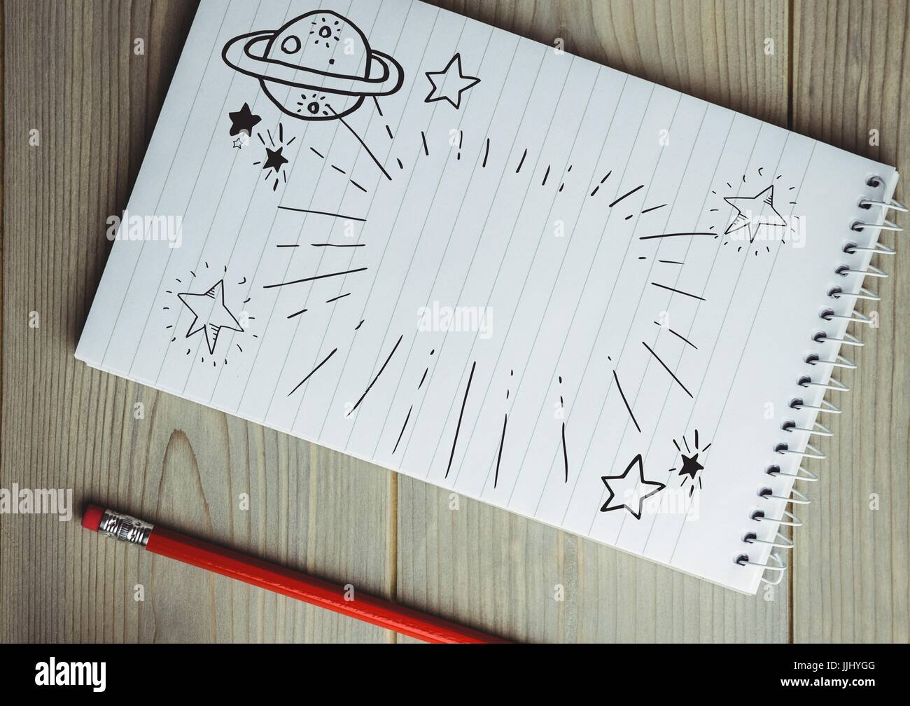 Platz doodle auf Notizblock neben roter Buntstift Stockfoto