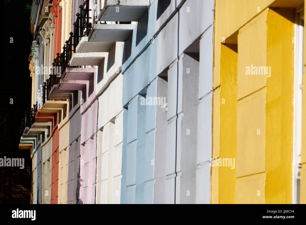 Pastell farbigen Gehäuse auf Hartland Road, Chalk Farm, London, UK Stockfoto